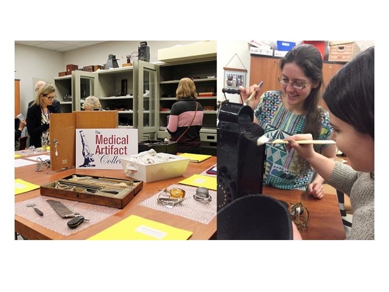 The interior of the medical artifact collection with people looking at items spread carefully across a few tables.